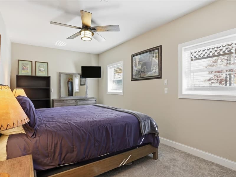 King bedroom with a lake-view window